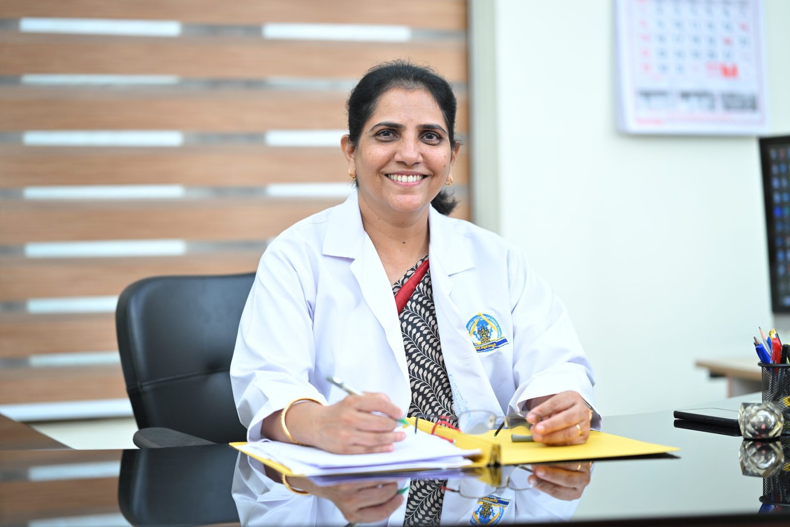 Dr. Elizabeth Koshi